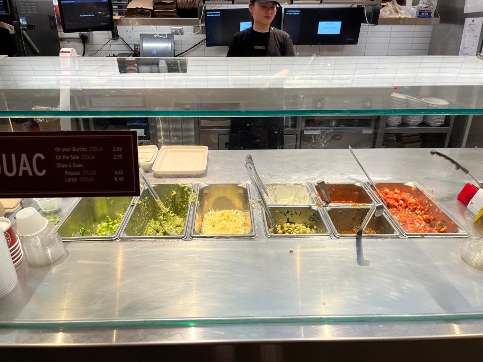 cold topping area of the chipotle line in a toronto location