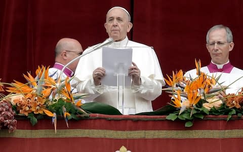Pope Francis delivers his "Urbi et Orbi" ("to the city and the world") message, in St. Peter's Square - Credit: AP