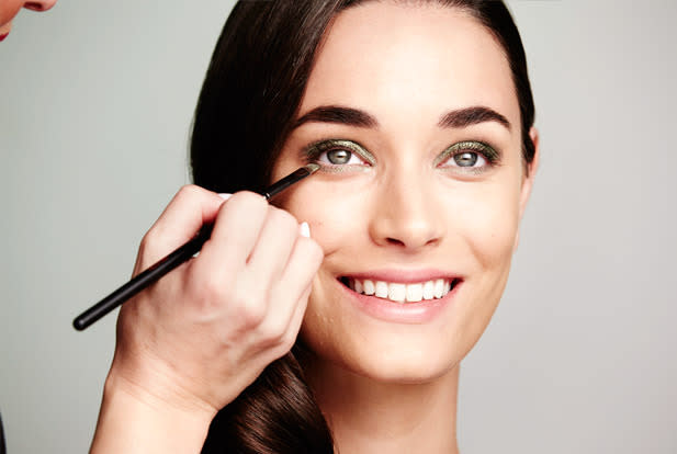 With an angled eyeliner brush, apply the same shade along the lower lash line. Keep your eyes closed until the product is dry.