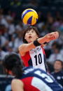 LONDON, ENGLAND - AUGUST 11: Yeon-Koung Kim #10 of Korea passes the ball against Japan during the Women's Volleyball on Day 15 of the London 2012 Olympic Games at Earls Court on August 10, 2012 in London, England. (Photo by Elsa/Getty Images)