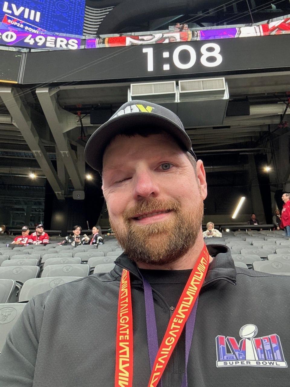 Decorated Oshkosh Army veteran Adam Alexander sitting before Super Bowl LVIII.