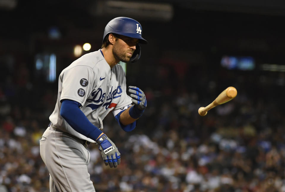 Chris Taylor of the Los Angeles Dodgers tosses his bat during a win last week over Arizona. (Photo by Norm Hall/Getty Images)