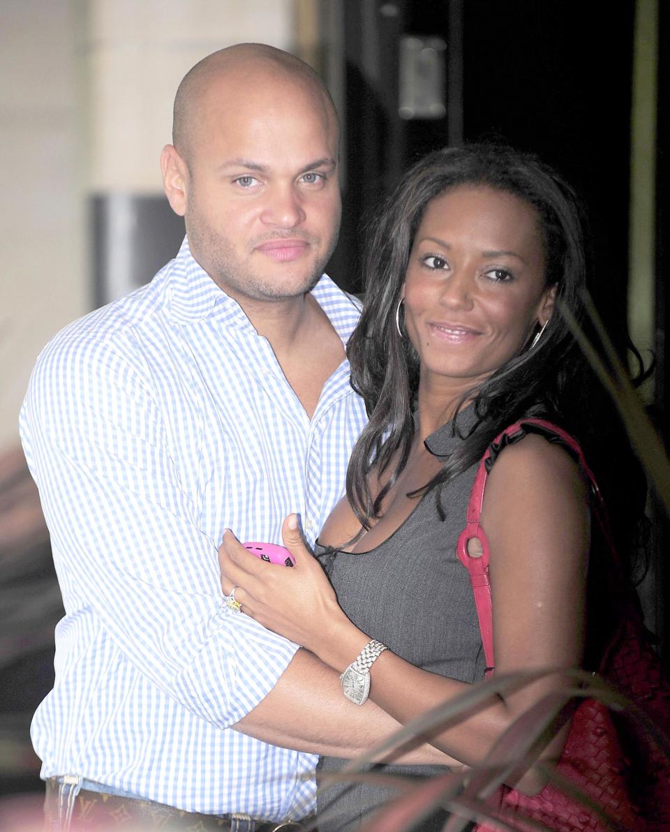 MEL B AND HUSBAND STEPHEN BELAFONTE LEAVING A HOTEL IN LONDON.