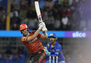 Sunrisers Hyderabad's captain Pat Cummins plays a shot during the Indian Premier League cricket match between Mumbai Indians and Sunrisers Hyderabad in Mumbai, India, Monday, May 6, 2024. (AP Photo/Rajanish Kakade)