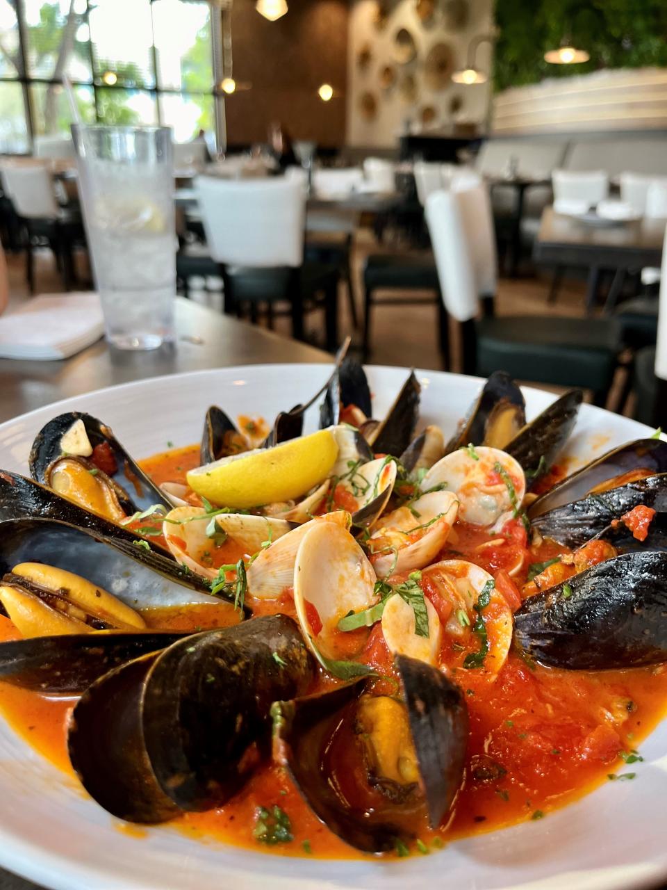 I have lots of food photos stored on my phone, including this clams & mussels fra diavolo appetizer in a spicy tomato sauce base from Two Meatballs in the Kitchen in Fort Myers..