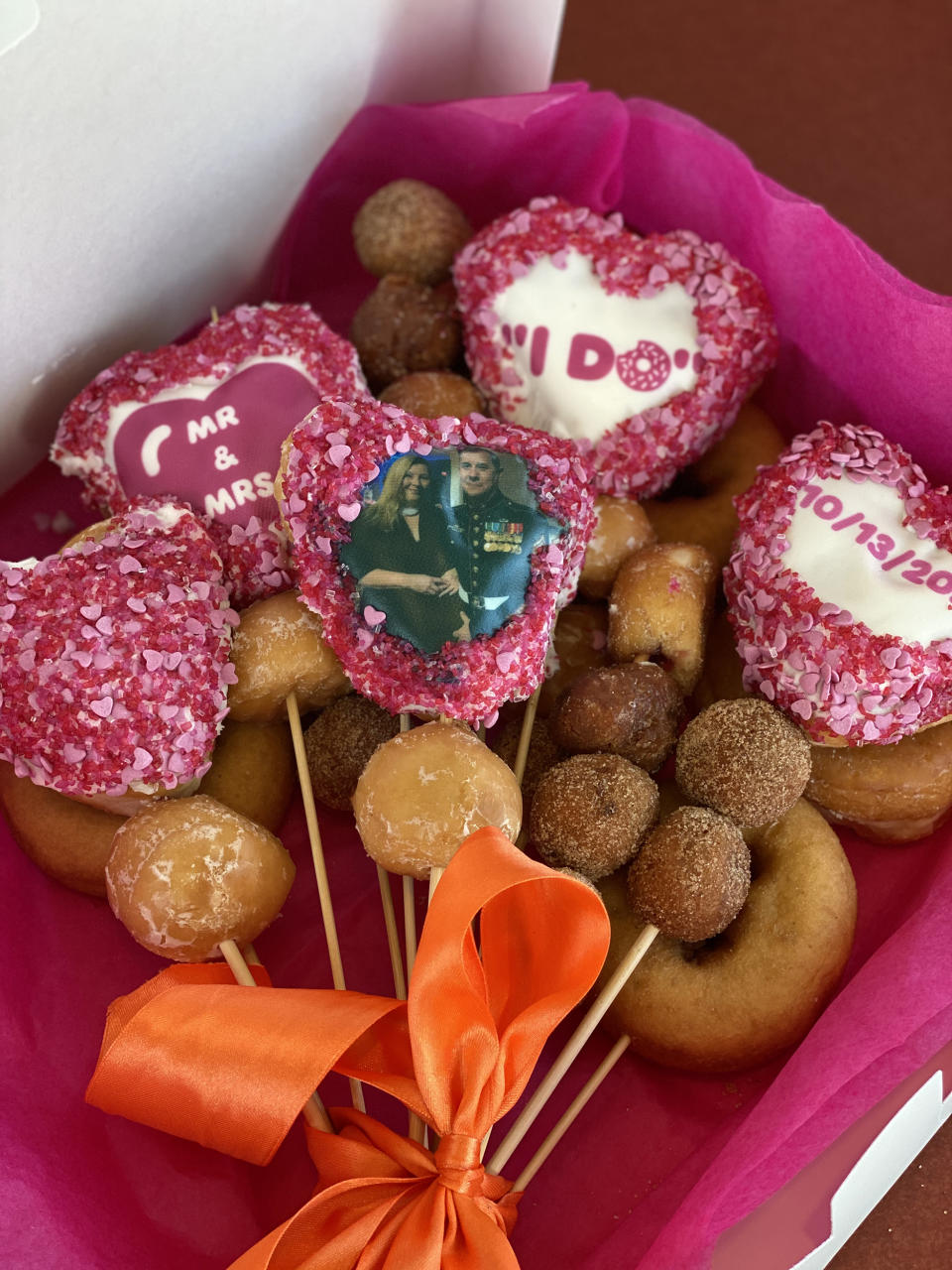 What wedding at Dunkin' wouldn't be complete with doughnuts? (Courtesy Jillian Gallagher and Emma Burke)