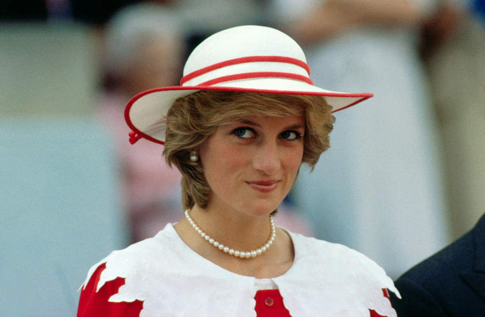 Diana, Princess of Wales, wears an outfit in the colors of Canada during a state visit to Edmonton, Alberta, with her husband. | Bettmann Archive