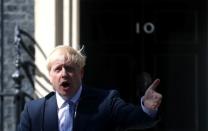 Britain's new Prime Minister, Boris Johnson, delivers a speech outside Downing Street, in London