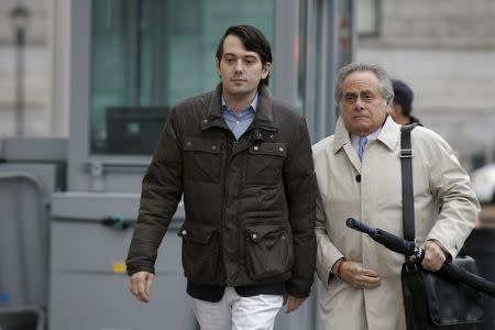 Former drug executive Martin Shkreli (L) arrives with his lawyer Benjamin Brafman at the U.S. Federal Courthouse in the Brooklyn borough of New York February 3, 2016. REUTERS/Brendan McDermid