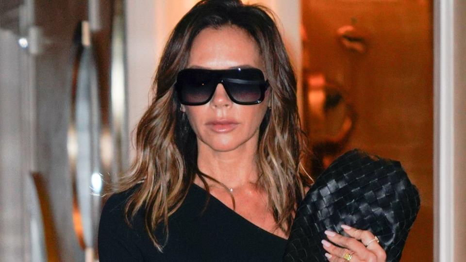 victoria beckham wearing large black sunglasses