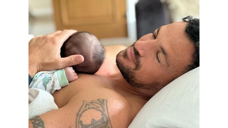 peter andre cradling baby daughter