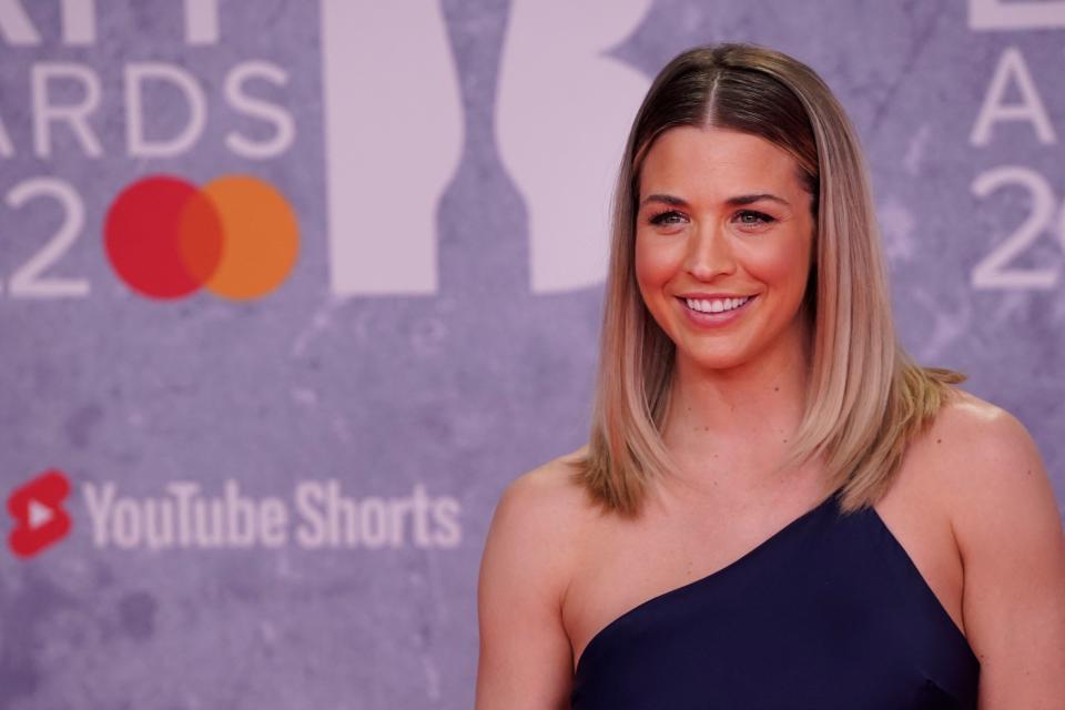 British actress and influencer Gemma Atkinson poses on the red carpet upon her arrival for the BRIT Awards 2022 in London on February 8, 2022. (Getty Images)