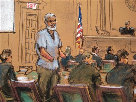 Abu Hamza al-Masri, the radical Islamist cleric facing U.S. terrorism charges, stands with his legal team in Manhattan federal court in New York in this artist's sketch, April 14, 2014. REUTERS/Jane Rosenberg