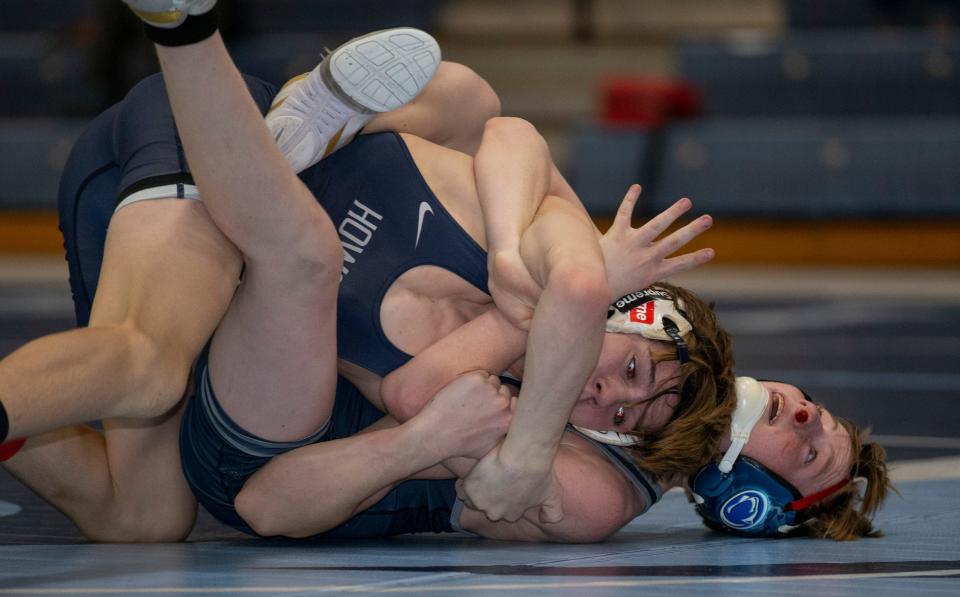 J.J. Machnik (top) of Howell wrestles Tyler Venet of Christian Brothers Academy in this 2021 file photo.