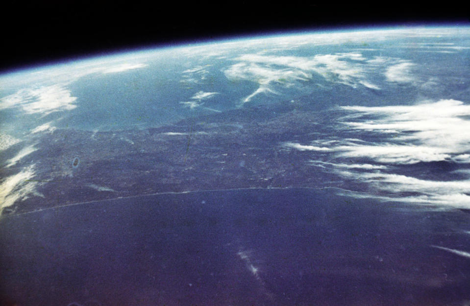 <p>Photo of the Earth taken by John Glenn with a 35-millimeterAnsco Autoset camera he had purchased just before liftoff, seen during MercuryAtlas 6 (Friendship 7) orbital flight on February 20, 1962.</p>