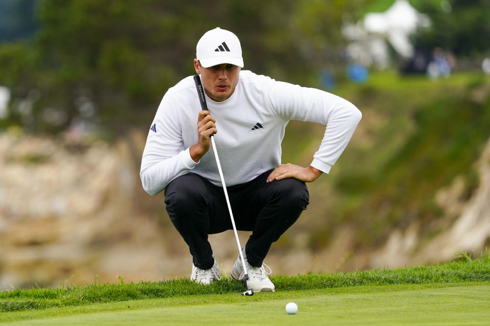 Ludvig Aberg lines up his putt on the fifth hole during the third round of the AT&T Pebble Beach Pro-Am golf tournament at Pebble Beach Golf Links. Mandatory Credit: Michael Madrid-USA TODAY Sports