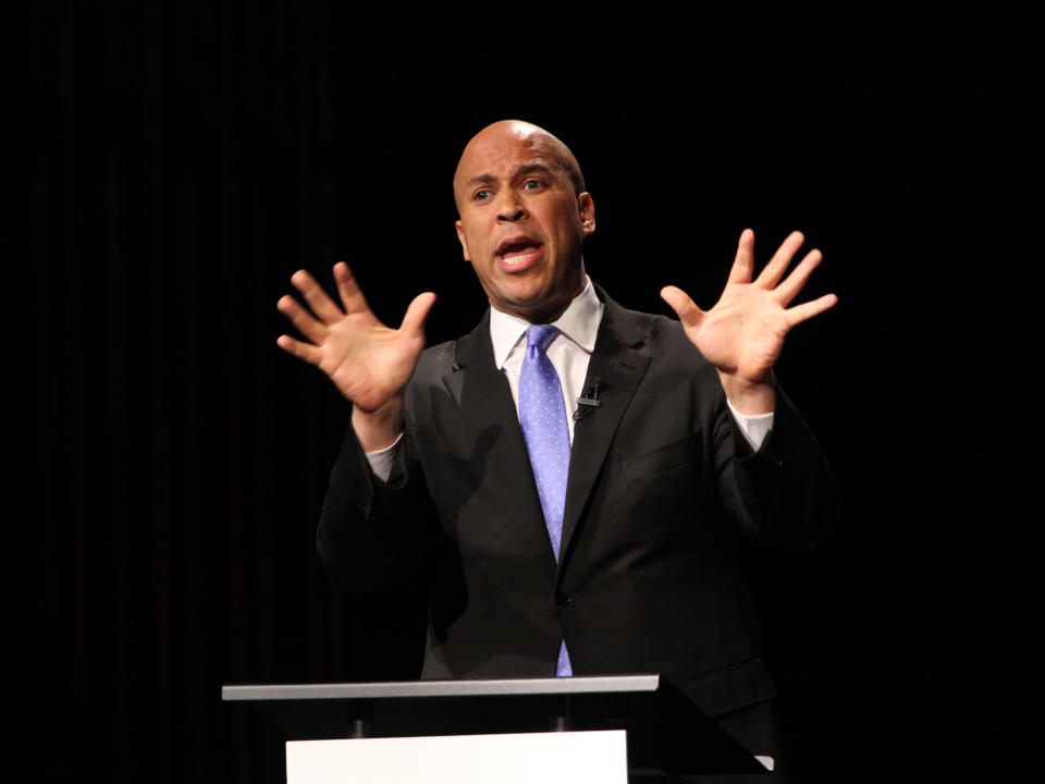 U.S. Senate candidates Cory Booker responds during the second televised debate with Steve Lonegan at Rowan University in Glassboro, N.J., Wednesdahy, Oct. 9, 2013. (AP Photo/Philadelphia Inquirer, Michael Bryant, Pool)