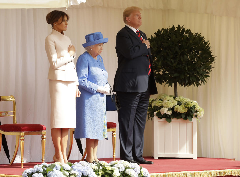 The Trumps stand alongside Queen Elizabeth II as they listen to the US national anthem at Windsor Castle.&nbsp; (Photo: PA Wire/PA Images)