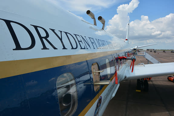 Sample collection probes are seen on the outside of NASA's DC-8 flying laboratory, part of the SEAC4RS airborne science mission, at Ellington Field in Houston, Aug. 22, 2013.