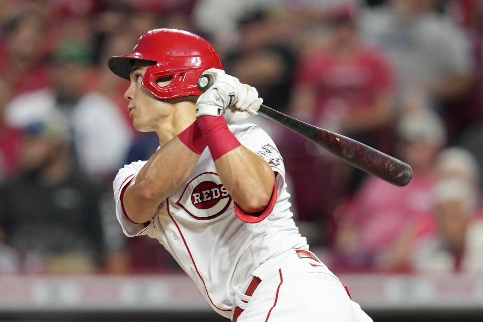 Cincinnati Reds' Stuart Fairchild watches his single during the third inning of the team's baseball game against the Boston Red Sox on Wednesday, Sept. 21, 2022, in Cincinnati. (AP Photo/Jeff Dean)