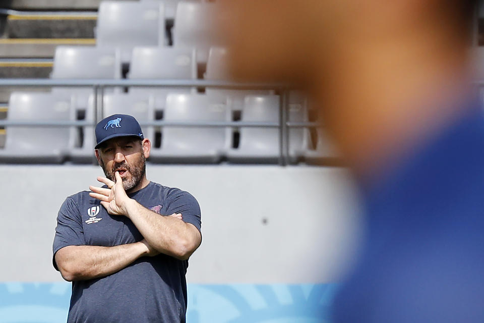 Argentine rugby union head coach Mario Ledesma watches his team training during their captain's run prior to the Rugby World Cup in Tokyo, Japan, Thursday, Sept. 19, 2019. (AP Photo/Eugene Hoshiko)