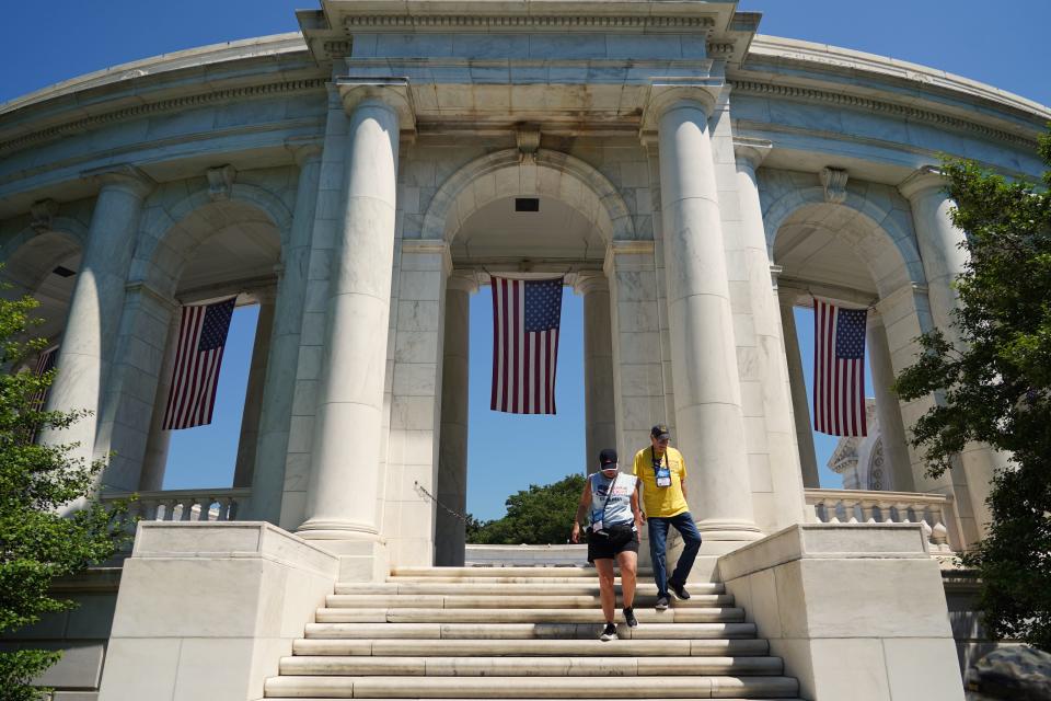 David Barry visits the Arlington National Cemetery's Memorial Amphitheater with his daughter Sonya Williams.