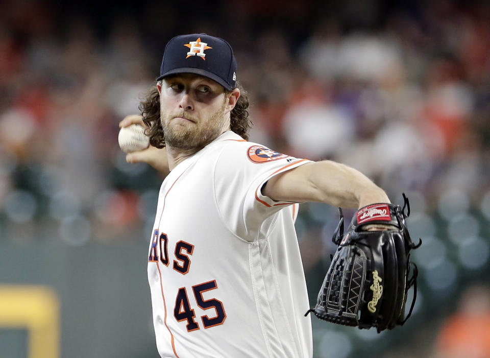 Houston Astros starting pitcher Gerrit Cole (45) throws during the first inning of a baseball game against the Colorado Rockies Wednesday, August 7, 2019, in Houston. (AP Photo/Michael Wyke)