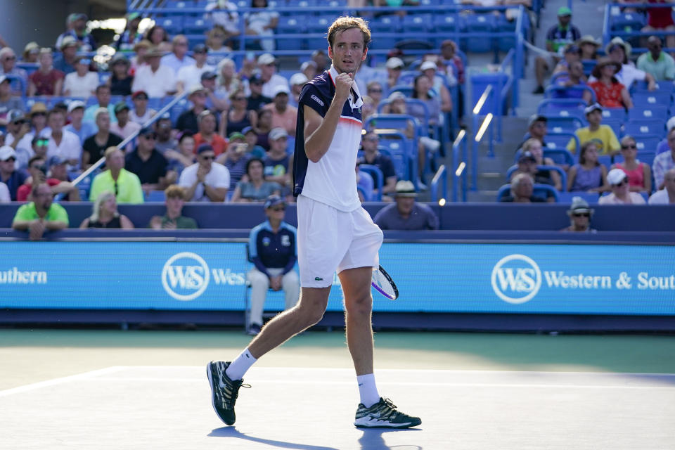 Daniil Medvedev, of Russia, celebrates after defeating David Goffin, of Belgium, in the men's final match during the Western & Southern Open tennis tournament Sunday, Aug. 18, 2019, in Mason, Ohio. (AP Photo/John Minchillo)