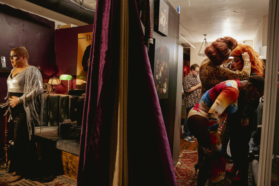 Keleigh Klarke (left) changes into her second look for the evening as other performers get into their own stage wear.<span class="copyright">Andrea Morales for TIME</span>