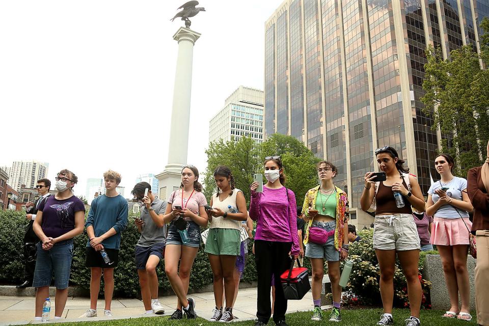 A number of supporters gather for a rally for Indigenous Peoples Day hosted by the United American Indians of New England (UAINE) at the State House before the summer recess on Wednesday, July 20, 2022. 