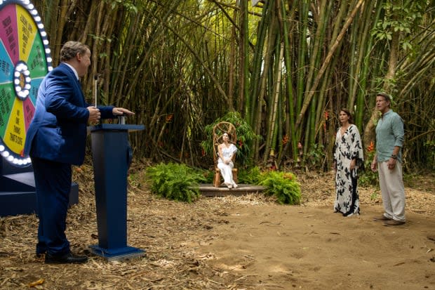 Roselyn Sanchez looks on while Andy Richter plays a game show host to Teri Hatcher and James Denton's characters on a Season 2 episode of "Fantasy Island."<p>Laura Magruder/FOX</p>