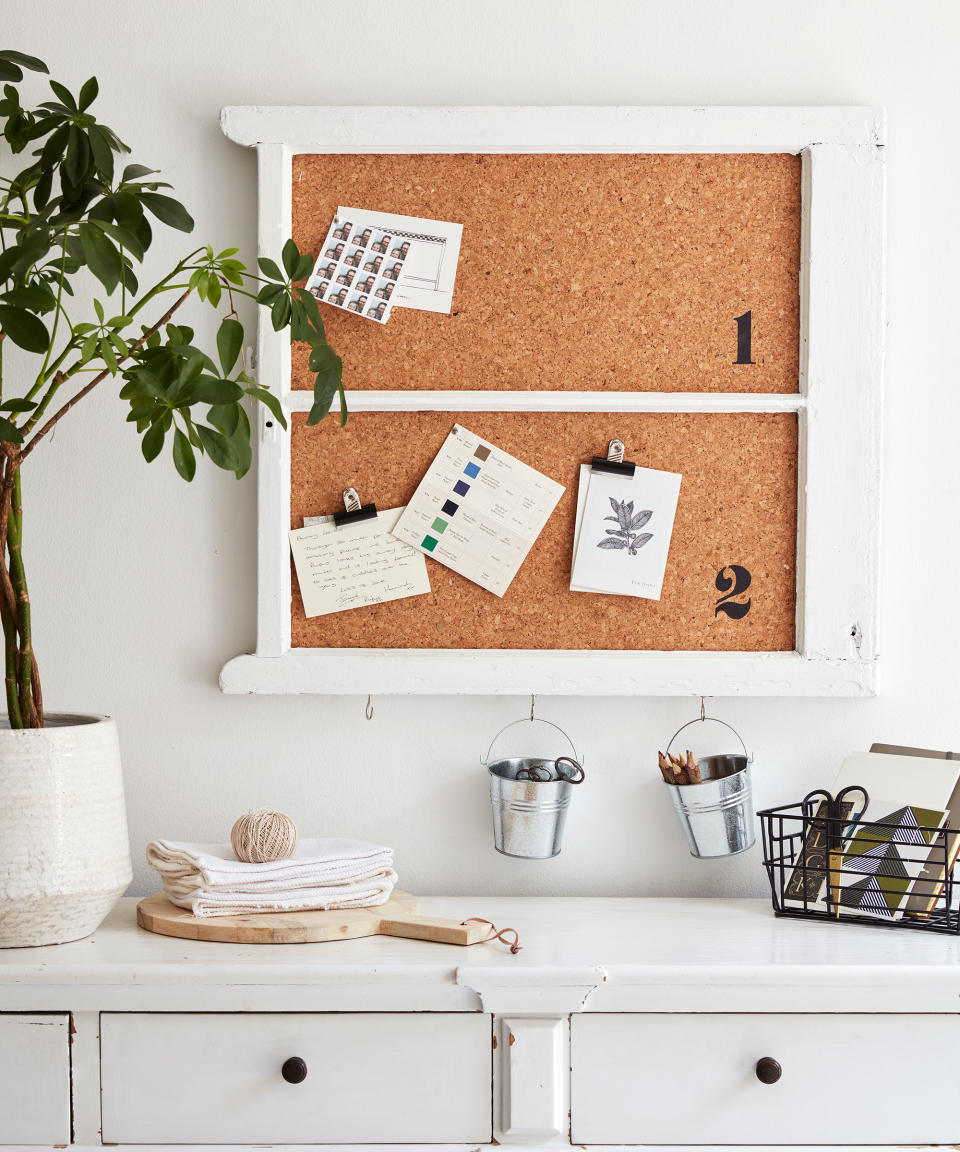 <p> Need a spot in the kitchen to keep the whole family in check? Create a noticeboard by fixing cork tiles onto the back of an old frame using a glue gun or strong tape. Screw hooks into the bottom edge for mini buckets and fix to the wall with picture hooks. Stencil numbers in the corners with black paint, then use to pin postcards and family reminders up. </p> <p> However, to ensure your family does use it you need to think bout how it's going to be used when you create it. 'I would suggest starting off with a cork noticeboard and lots of push pins,' says Aisha from Hobbycraft.  </p> <p> 'This way the information you want to display can be added and moved around as you like as you discover what works best for you. Once you’ve settled into a rhythm then start looking at ways to further enhance your notice board.' </p>