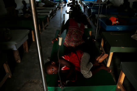 A girl receives treatment along with others at the cholera treatment center at the hospital after Hurricane Matthew hit Jeremie, Haiti. REUTERS/Carlos Garcia Rawlins