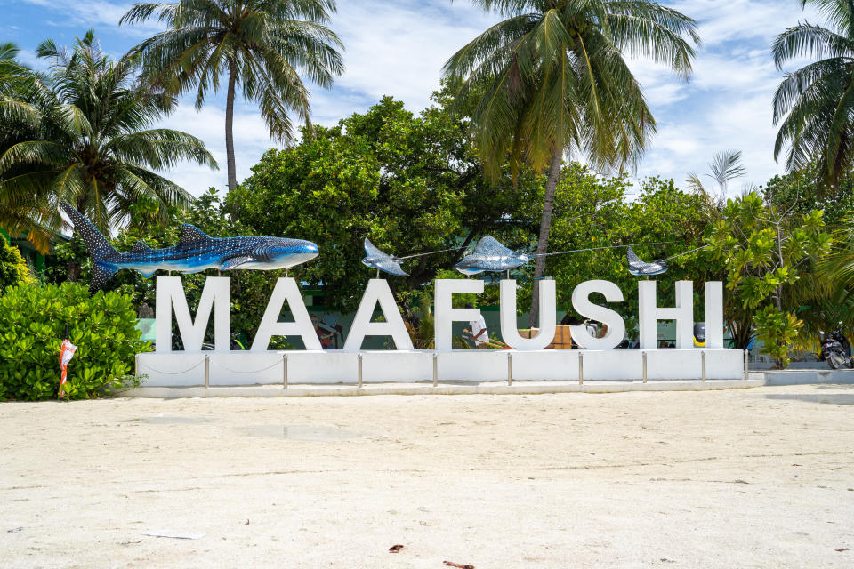 Maafushi Island, Maldives - November 26, 2019: Welcome sign for the island of Maafushi, a tourist and local island with hotels, resorts and shops