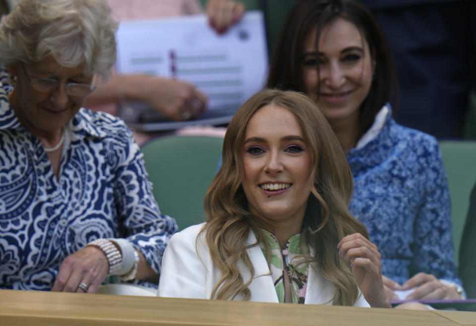 Actress Rose Ayling-Ellis takes her seat on Centre Court on day three of the Wimbledon tennis championships in London, Wednesday, June 29, 2022. (AP Photo/Alastair Grant)