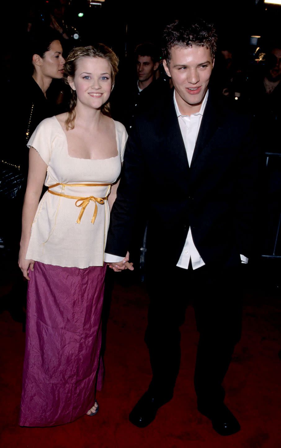 <p>In 1999, Witherspoon scored a huge hit with her role in <em>Cruel Intentions</em>, as well as her role in <em>Election</em>. Still, her style hadn't grown up just yet, as evidenced by this photo of her and Phillippe at the <em>Cruel Intentions</em> premiere.<br></p>