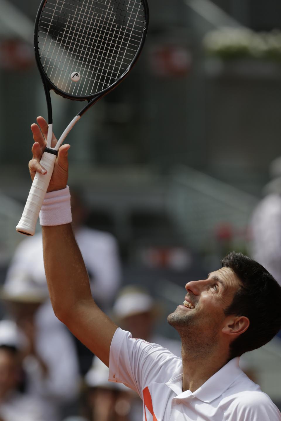 Novak Djokovic, from Serbia, celebrates after winning Taylor Fritz, from United States during the Madrid Open tennis tournament in Madrid, Tuesday, May 7, 2019. (AP Photo/Bernat Armangue)