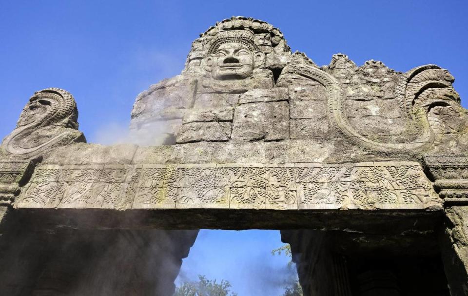 Stone faces and snakes patterned after the Angkor Wat temple in Cambodia greet visitors at the new Kingdoms of Asia exhibit at the Fresno Chaffee Zoo with expansive new exhibits for Malayan tigers, Komodo dragons, sloth bears, Asian songbirds, and more. CRAIG KOHLRUSS/ckohlruss@fresnobee.com