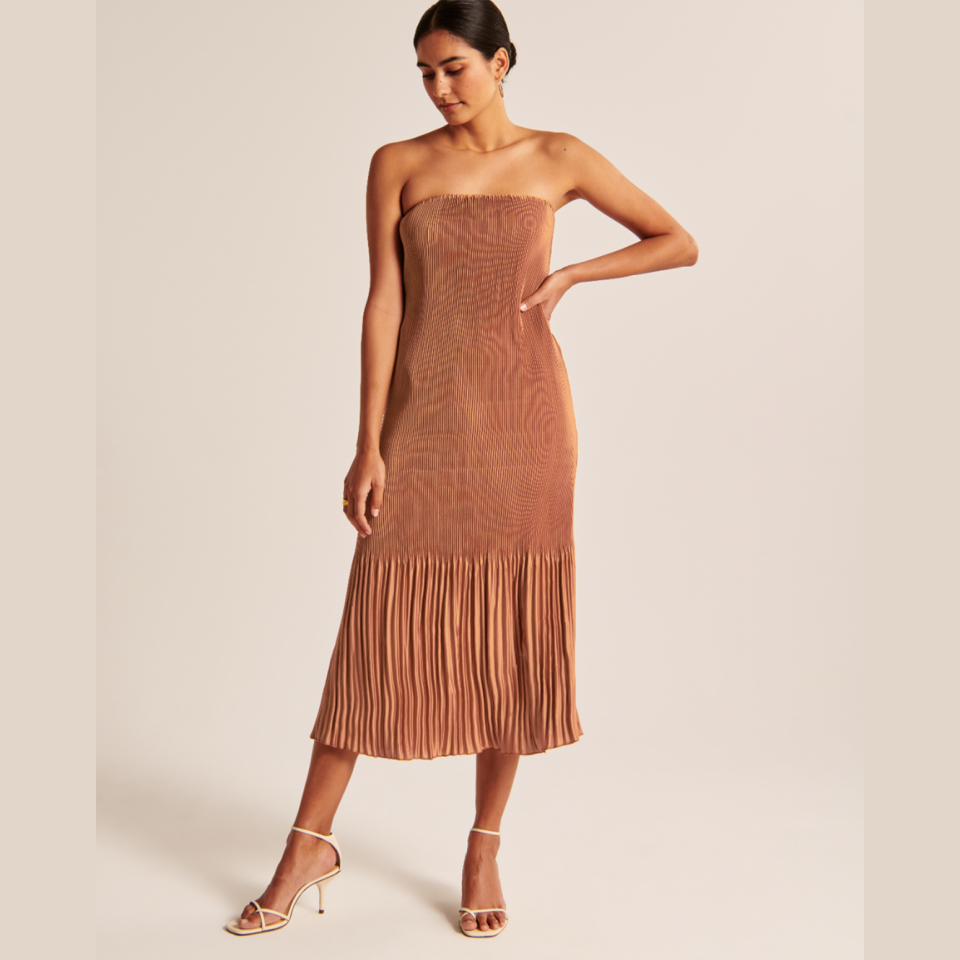 <p><a href="https://go.redirectingat.com?id=74968X1596630&url=https%3A%2F%2Fwww.abercrombie.com%2Fshop%2Fus%2Fp%2Fstrapless-pleat-release-midi-dress-53340819%3FcategoryId%3D63451269%26faceout%3Dmodel%26seq%3D02&sref=https%3A%2F%2Fwww.womenshealthmag.com%2Frelationships%2Fg38439489%2Fbest-winter-wedding-guest-dresses%2F" rel="nofollow noopener" target="_blank" data-ylk="slk:Shop Now;elm:context_link;itc:0;sec:content-canvas" class="link ">Shop Now</a></p><p>Giselle Pleat Release Midi Dress</p><p>abercrombie.com</p><p>$110.50</p>