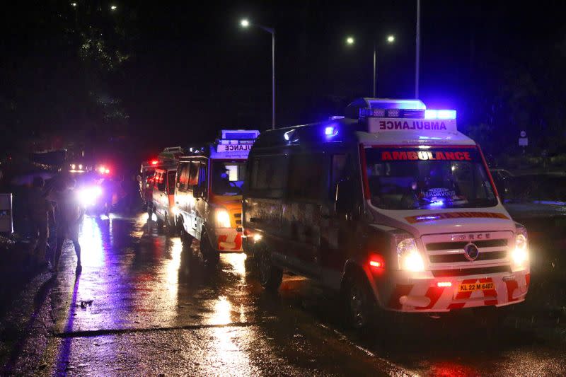 Rows of ambulances are seen outside the Calicut International Airport where a passenger plane crashed after it overshot the runway in Karipur