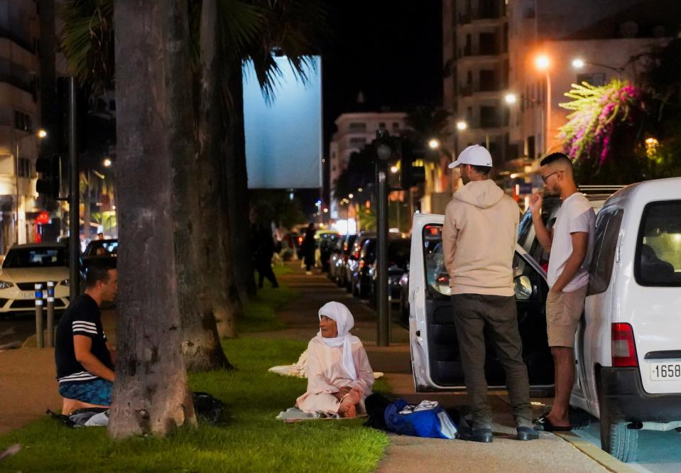 People gather on a street in Casablanca, following a powerful earthquake in Morocco (REUTERS)