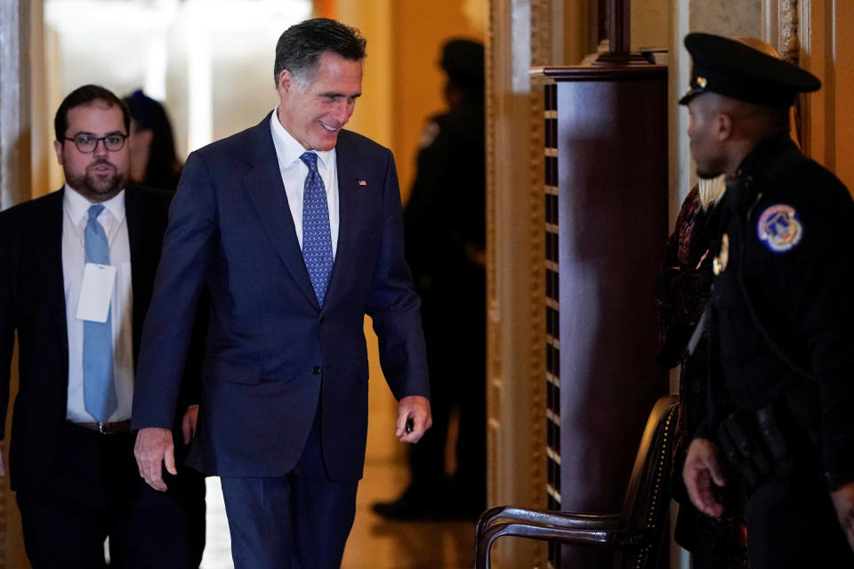 Senator Romney returns to the Senate Chamber after a break as the impeachment trial of U.S. President Donald Trump continues in Washington.