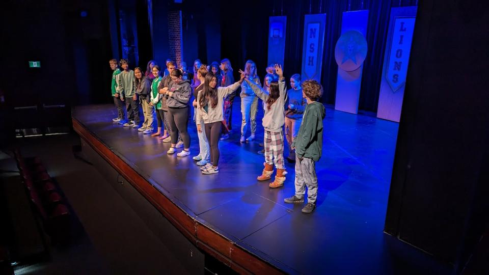Students from the cast of École St. Patrick High School rehearse for Mean Girls, the musical. 