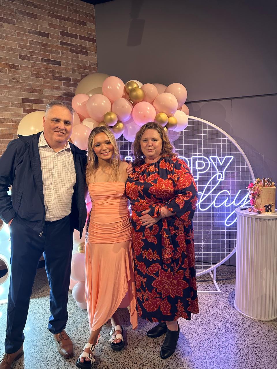 Troy with his wife Kaylene and their daughter Georgia at her 18th birthday party.