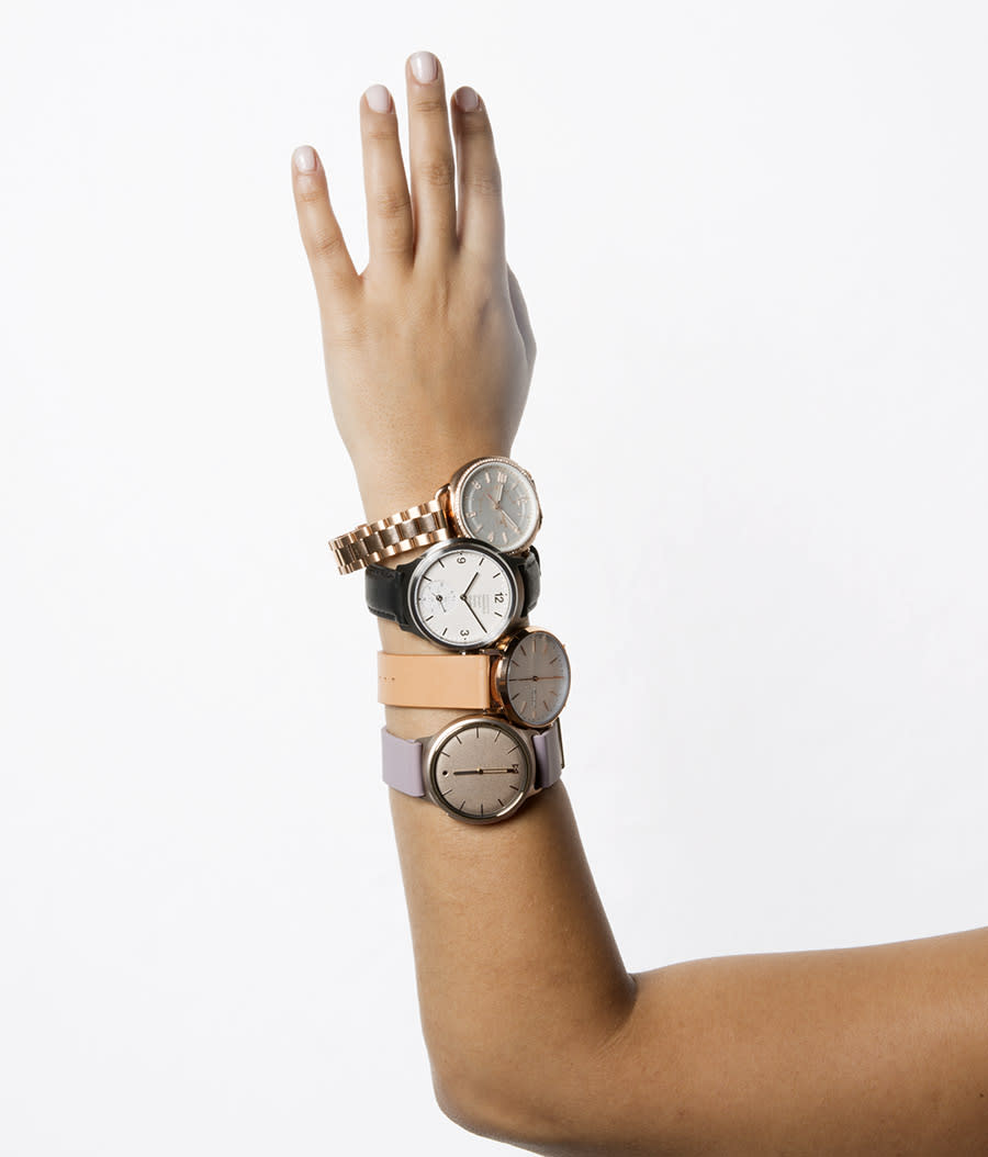 From top to bottom: Fossil, Mondaine, Skagen, and Misfit hybrid smartwatches. (Photo: Priscilla De Castro, Art Direction: Casey Hollister, Fashion Editor: Julie Tong)