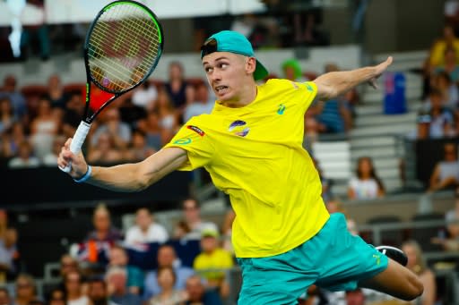 The Australians sealed the tie when a tenacious Alex de Minaur came from a set down to beat Canadian number one Denis Shapovalov 6-7 (6/8), 6-4, 6-2 in three hours