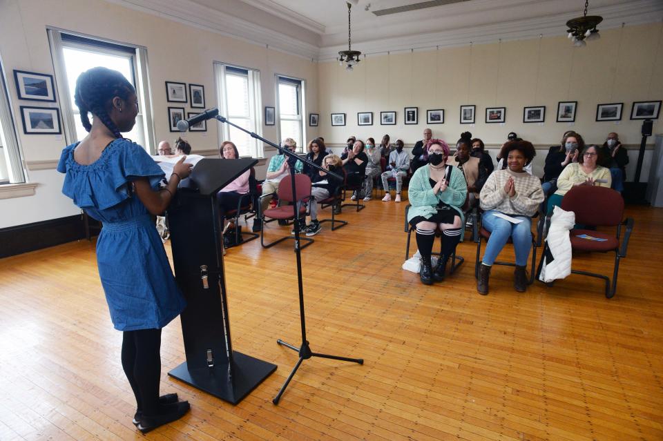 Hannah Baptiste, 17, during Brockton's First Youth Poet Laureate at the public library on Saturday, May 7, 2022.