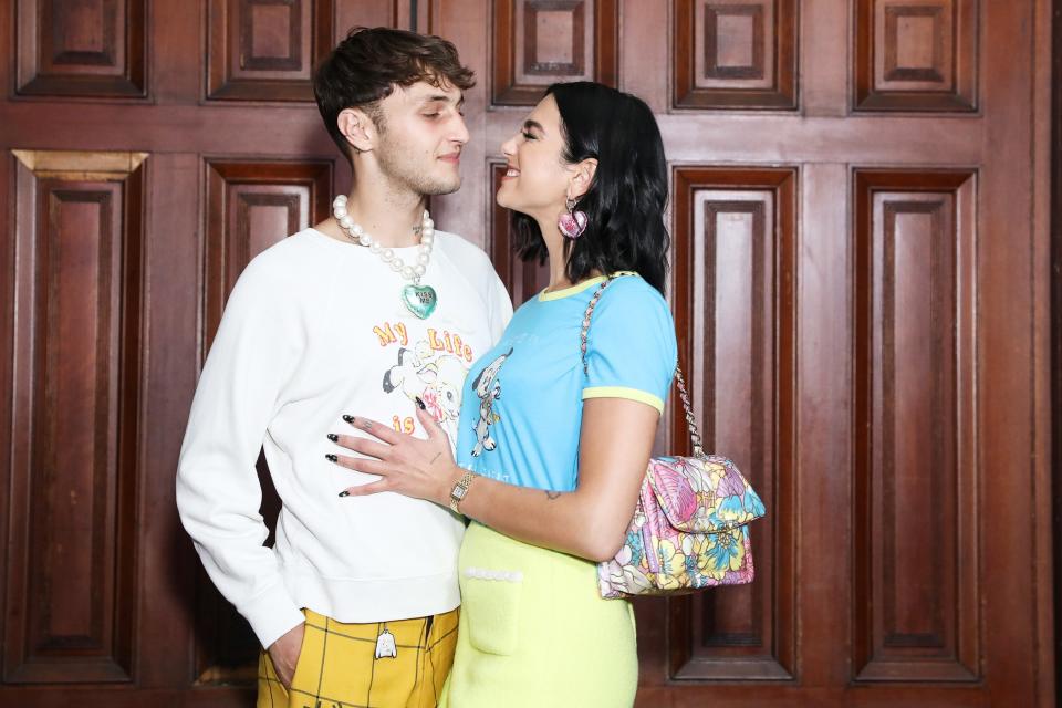 New couple Anwar Hadid and Dua Lipa share a sweet moment at the Marc Jacobs Spring 2020 Runway Show at the Park Avenue Armory in N.Y.C. on Wednesday. 