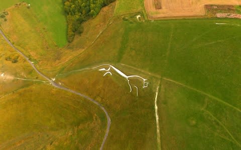 Uffington White Horse sits on the Ridgeway - Credit: GETTY