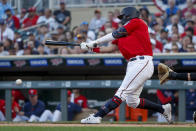 Minnesota Twins' Jose Miranda hits an RBI single against the Baltimore Orioles during the first inning of a baseball game Friday, July 1, 2022, in Minneapolis. (AP Photo/Bruce Kluckhohn)